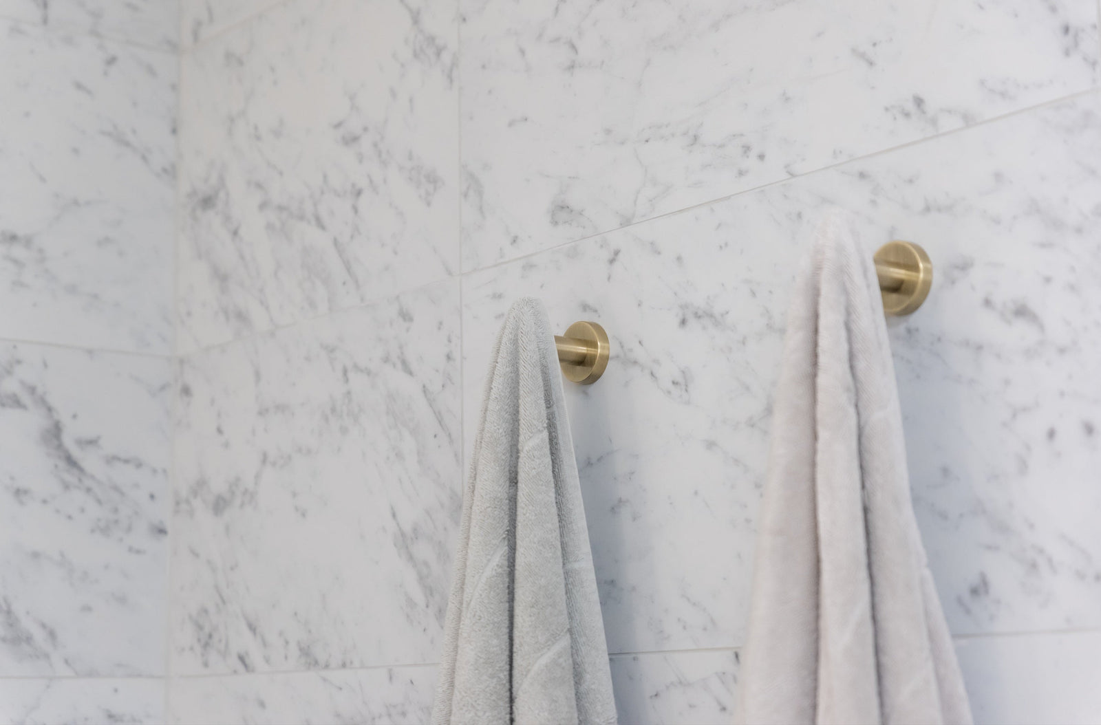 Meir Round Robe Hook - Tiger Bronze in a bathroom