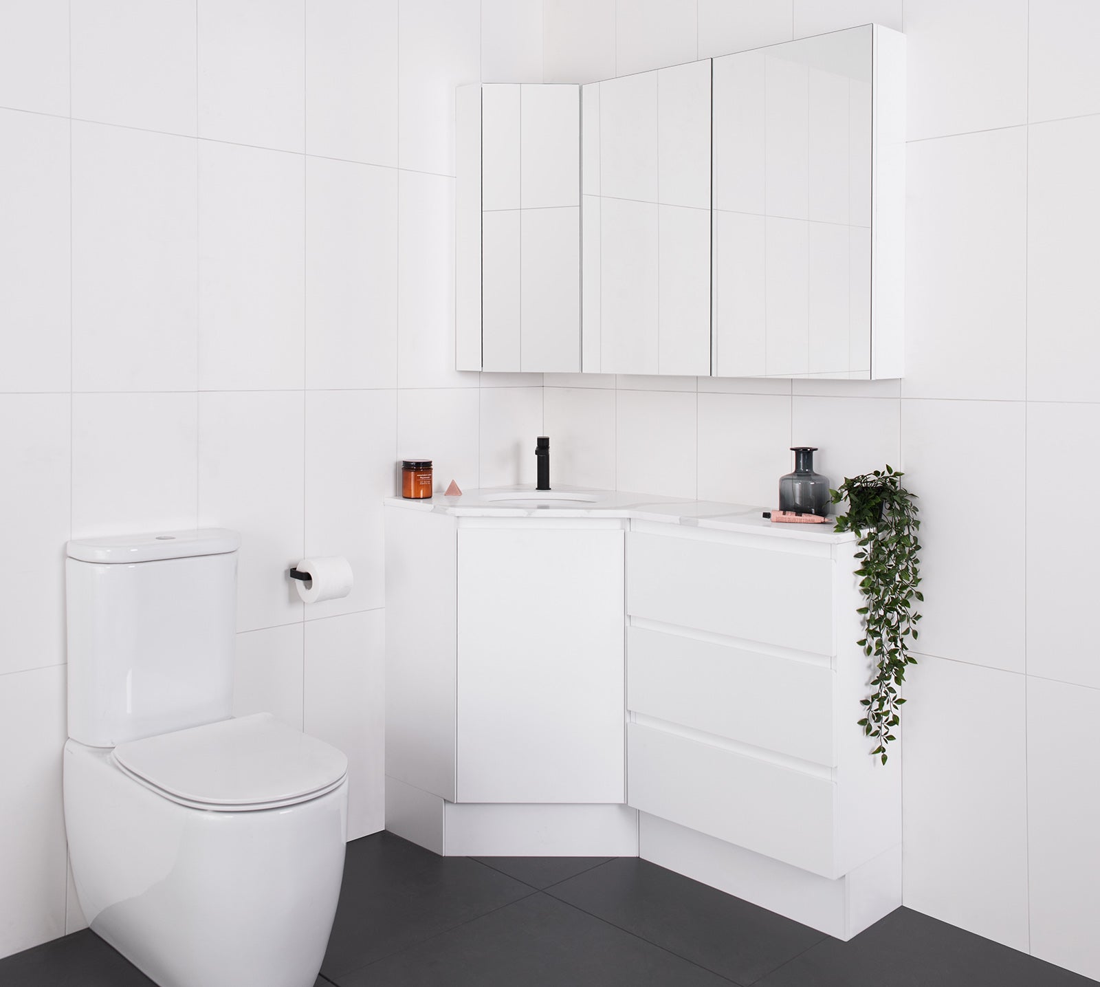 Glacier Corner Vanity, Floor Mount. 600 x 1200 Left hand Bowl with Drawers. Matte White polyurethane cabinet finish, Calacatta Cherry Pie benchtop.