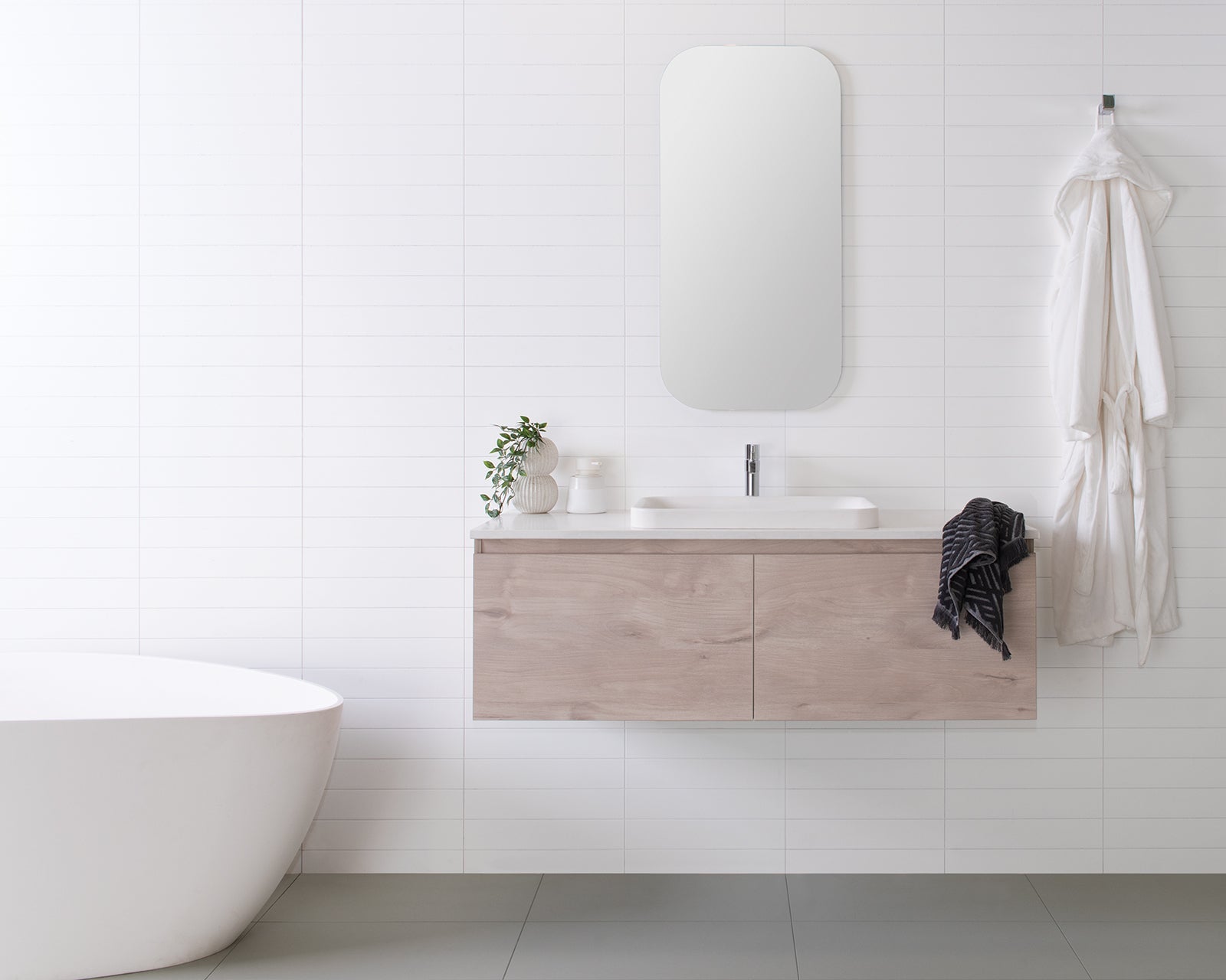 Glacier Full Depth, All-Drawer Slim 1200 Centre Bowl. Angora Oak Woodmatt Cabinet finish. Organic White Caesarstone benchtop. Pride Semi-Inset basin.