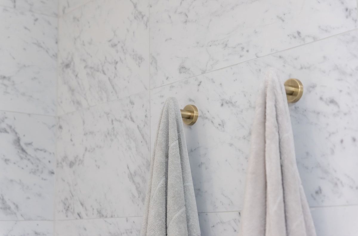 Meir Round Robe Hook - Tiger Bronze in a bathroom