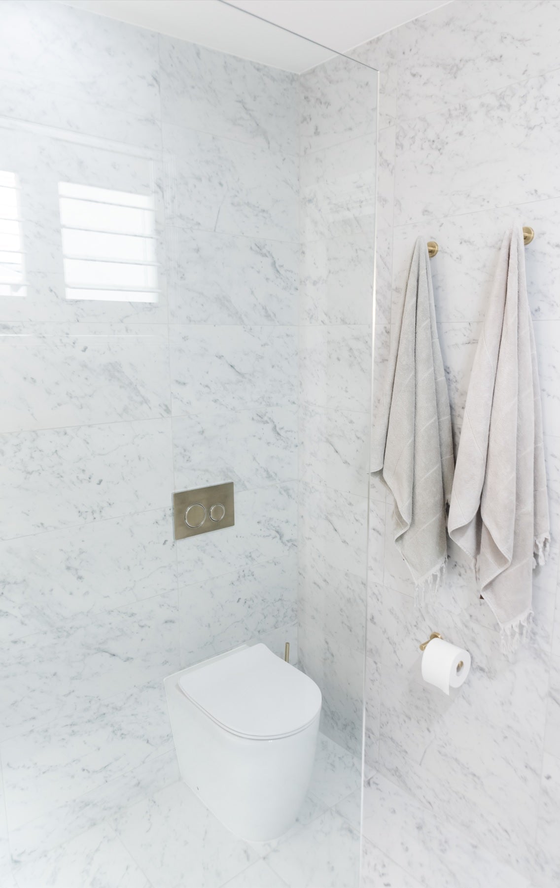 Meir Round Robe Hook - Tiger Bronze in a bathroom