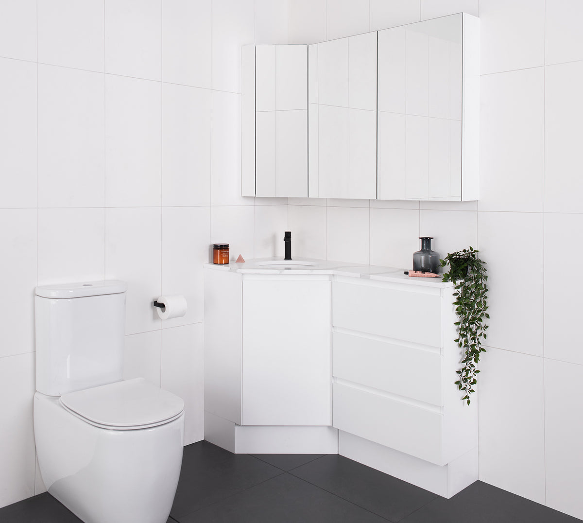 Glacier Corner Vanity, Floor Mount. 600 x 1200 Left hand Bowl with Drawers. Matte White polyurethane cabinet finish, Calacatta Cherry Pie benchtop.