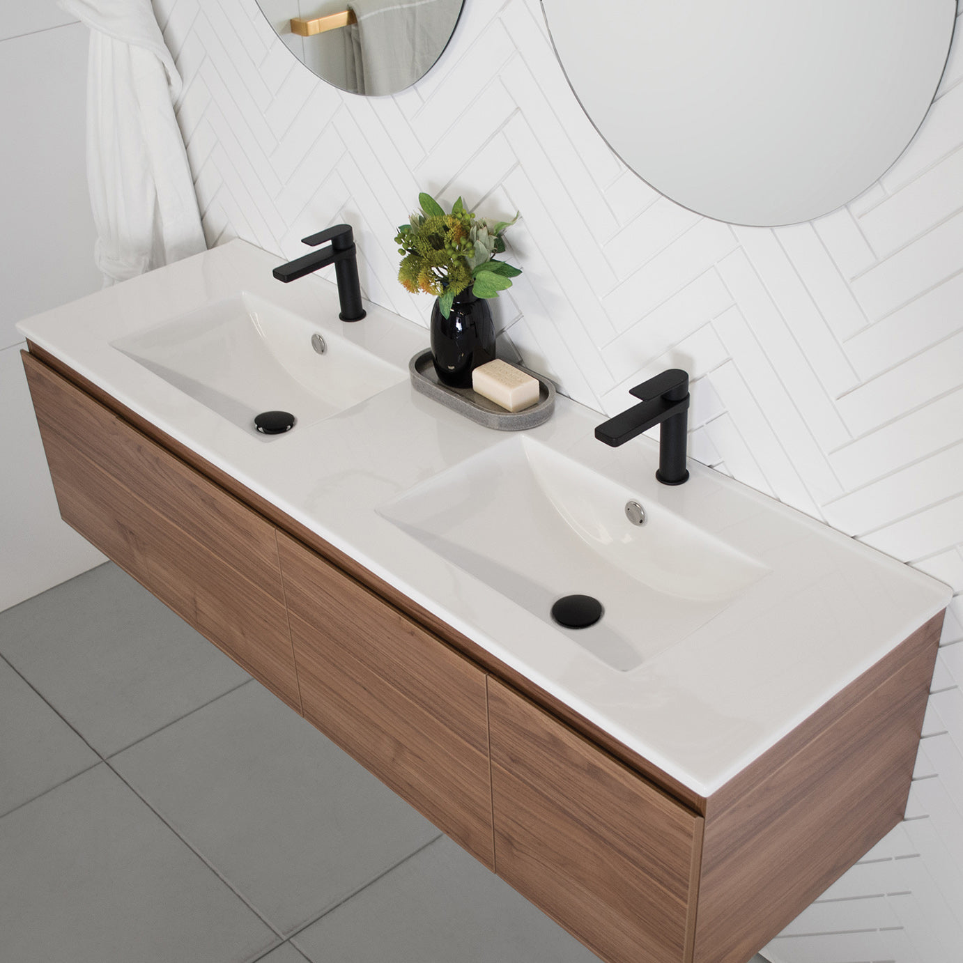 Glacier Full Depth, Door & Drawer Twin 1200 Centre Bowl. Boston Oak textured cabinet finish. 20mm Sugar Cream Cherry Pie benchtop. Oval Under-Counter Basin. 750mm Arch Mirror.