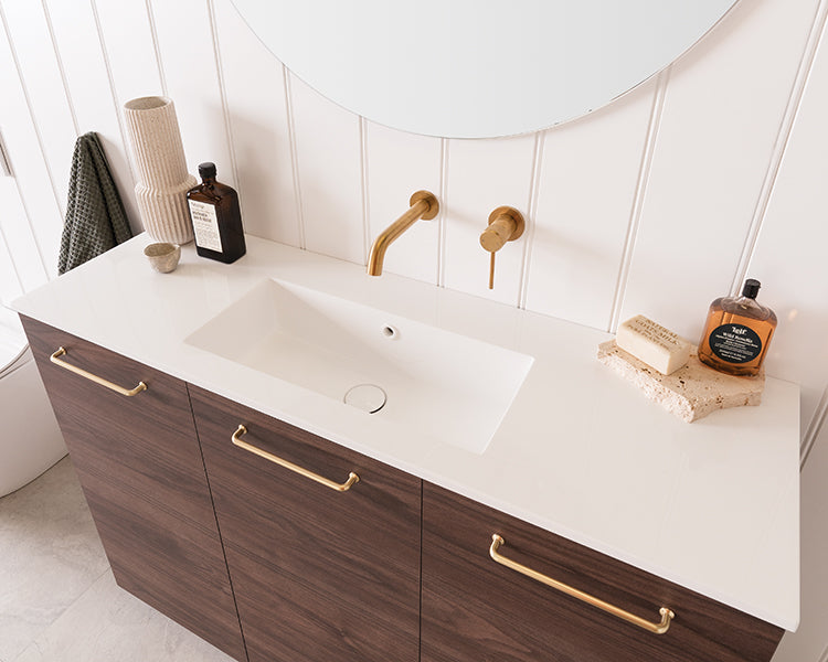 ADP Glacier vanity: Cast Marble moulded top option with integrated overflow and White, Black or Chrome overflow ring cover.