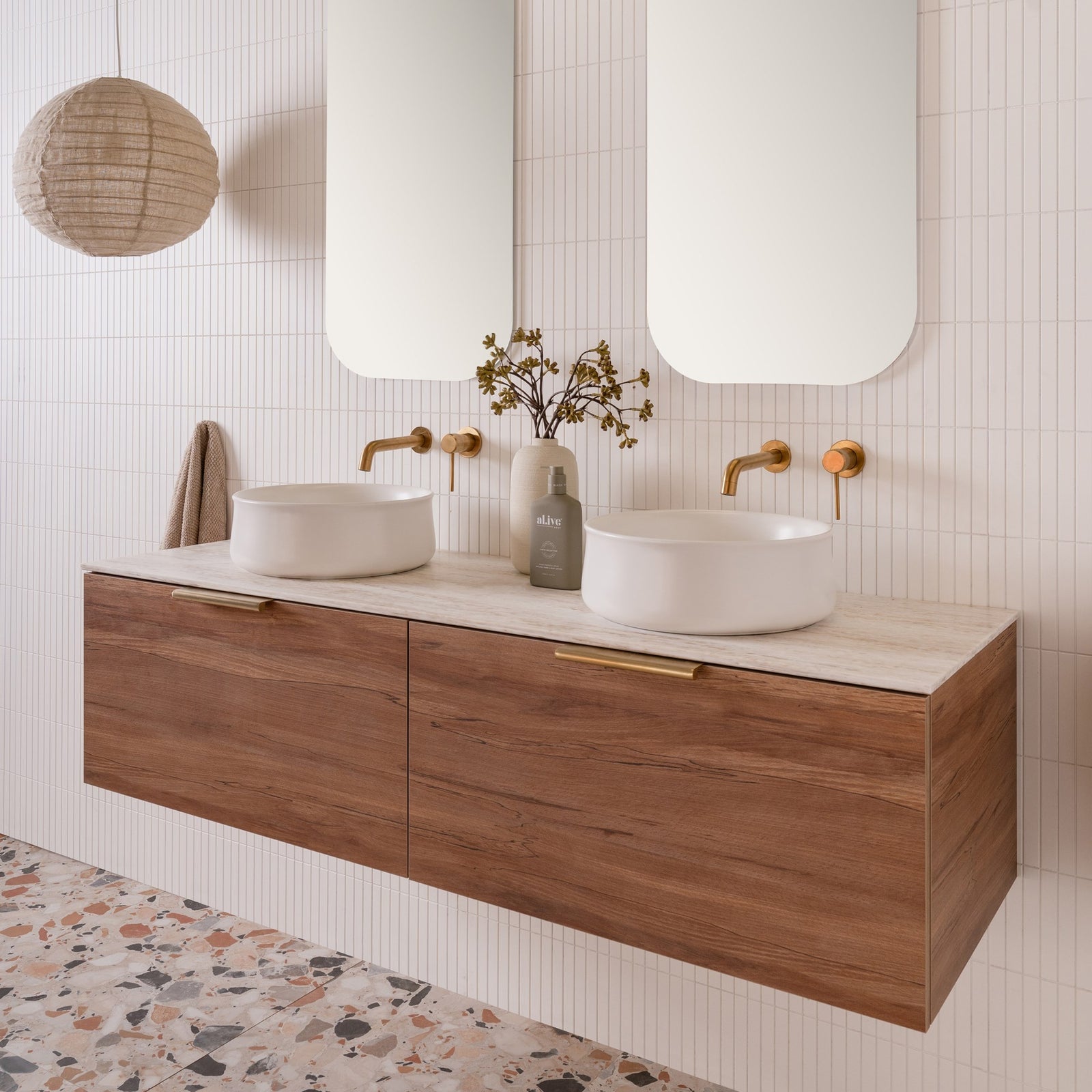 Glacier Full Depth, All-Drawer Slim 1500 Double Bowl, Australian Native Woodmatt, 12mm Sakal Durasein benchtop, Francis Handles in Brushed Brass Jennifer Above Counter basins, Stadium Mirrors & Soul Tapware in Brushed Brass