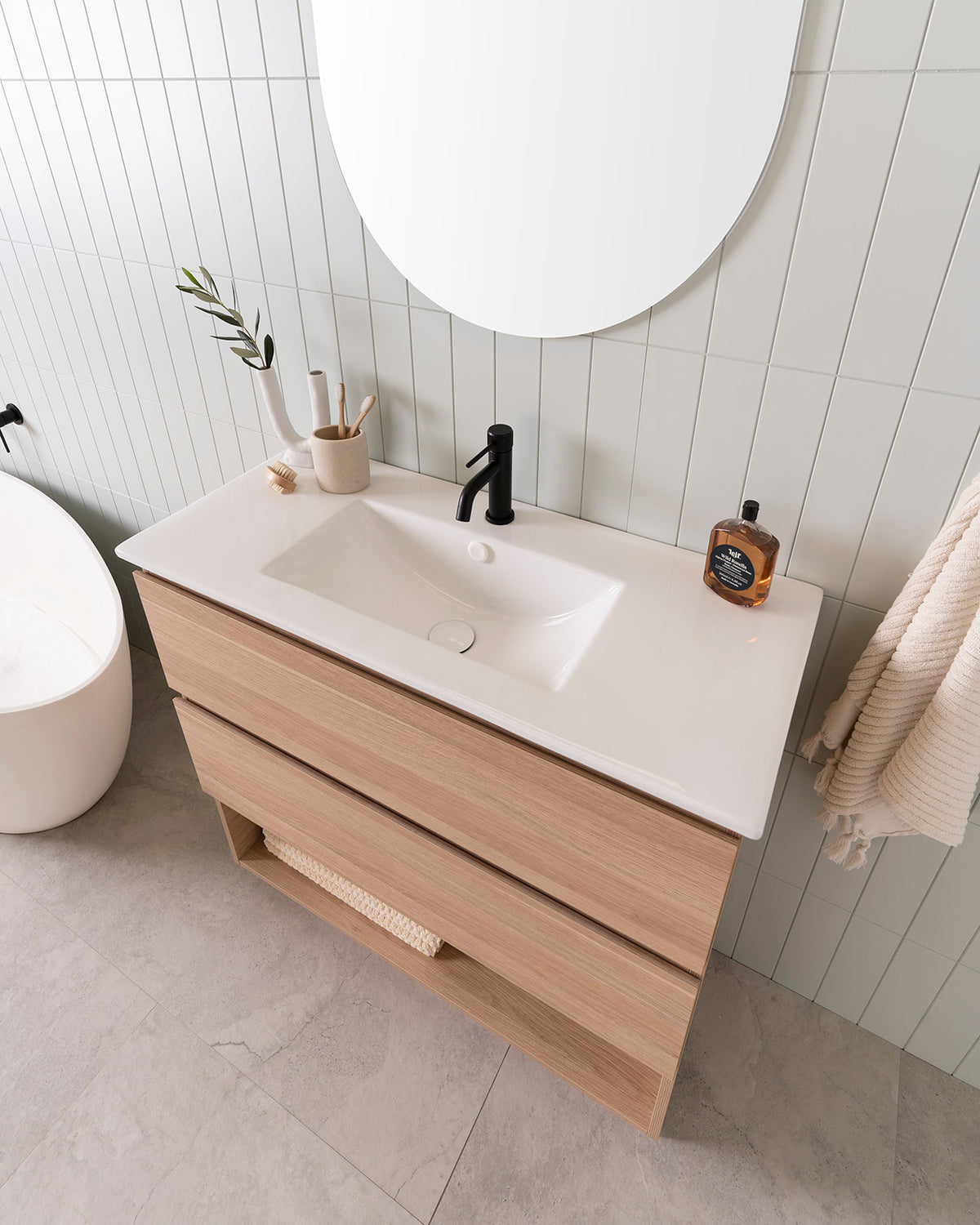 ADP Glacier vanity: Ensuite Ceramic Moulded Top with white overflow cover. Soul Groove basin mixer in Matte Black