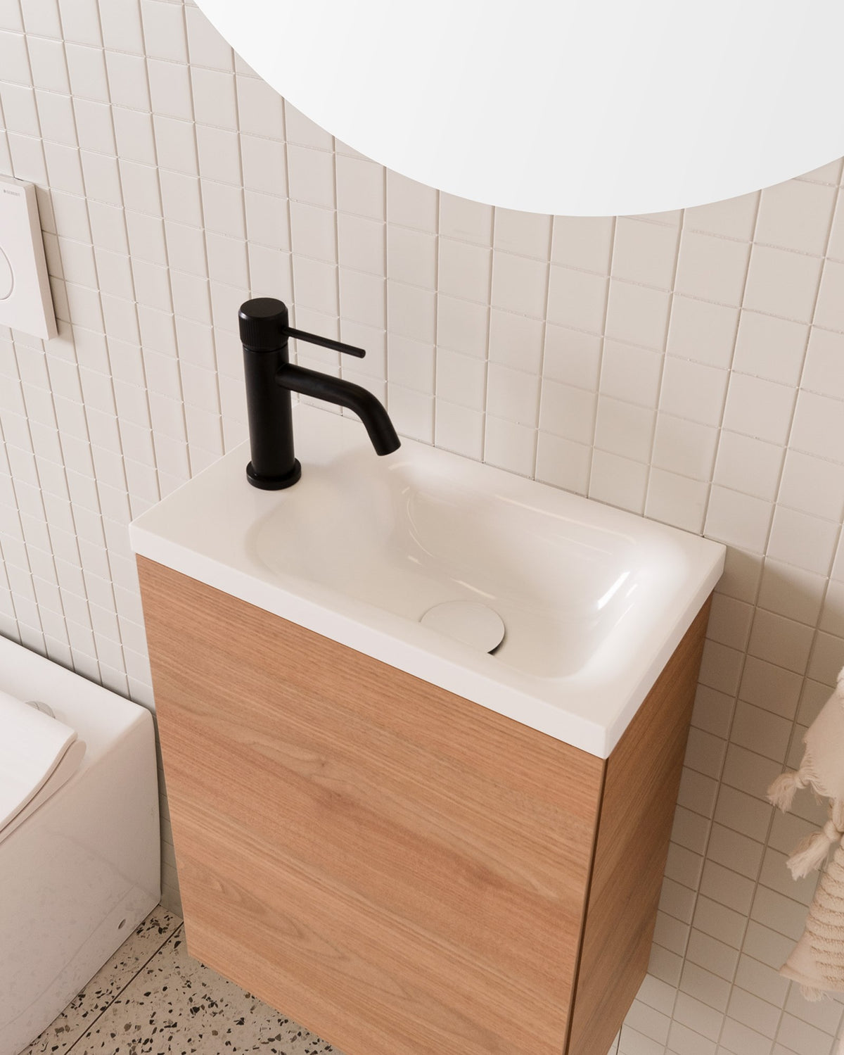 Glacier Mini, Wall Hung, 400mm centre bowl. Tasmanian Oak Woodmatt cabinet finish with Cast Marble Moulded top.