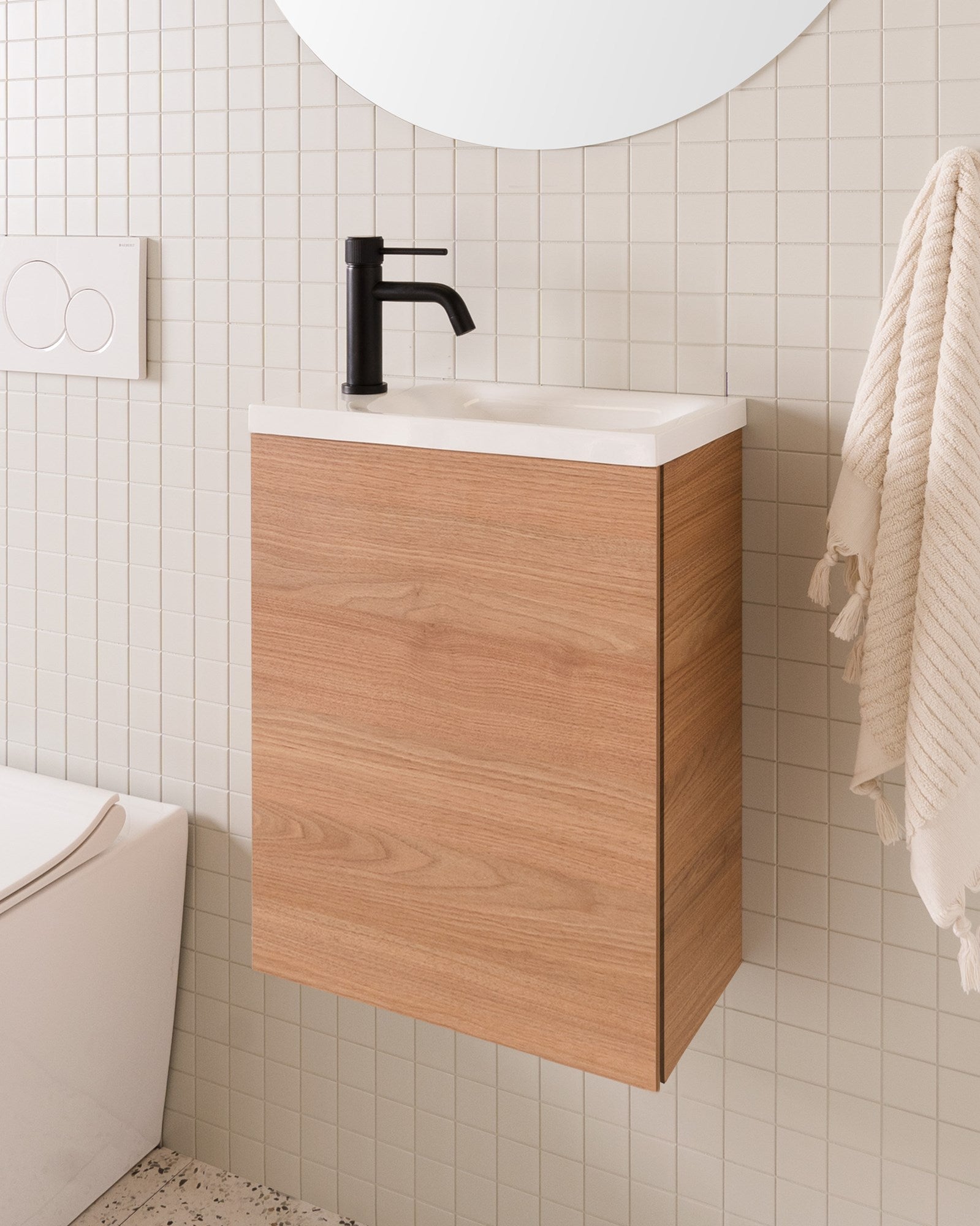 Glacier Mini, Wall Hung, 400mm centre bowl. Tasmanian Oak Woodmatt cabinet finish with Cast Marble Moulded top.