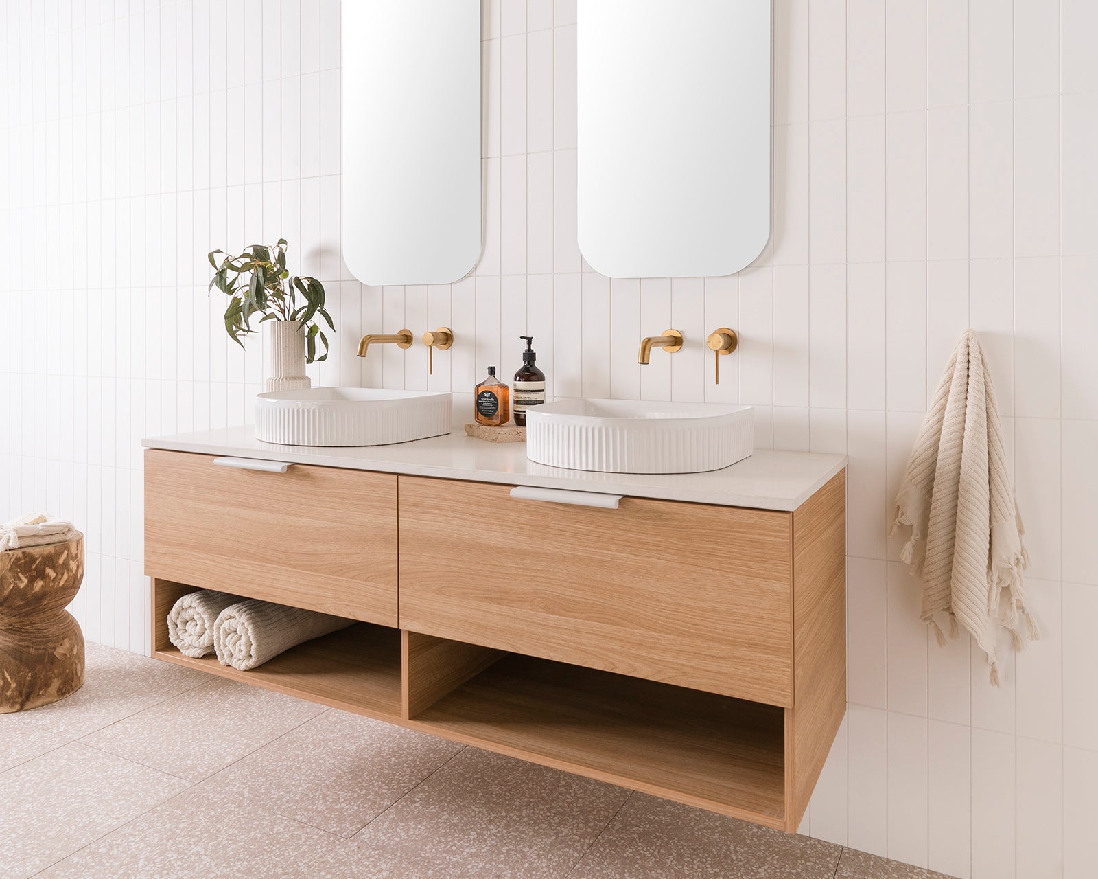Glacier Pro Full depth, Shelf, Slim 1500 Double Bowl. Elegant Oak Woodmatt cabinet finish with Matte White Francis Handles. 20mm Organic White Caesarstone Benchtop and Arch Fluted Basins. 2 x 450mm Stadium Mirrors